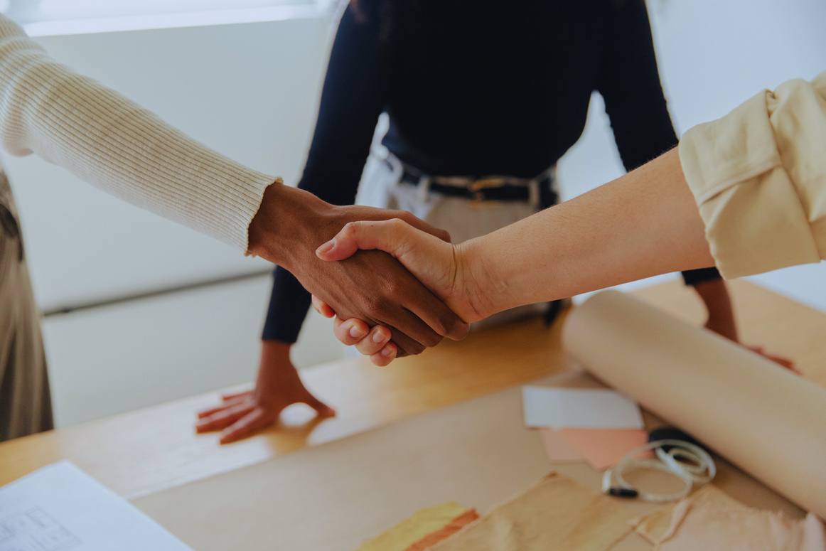 Two Diverse Business Partners Shaking Hands